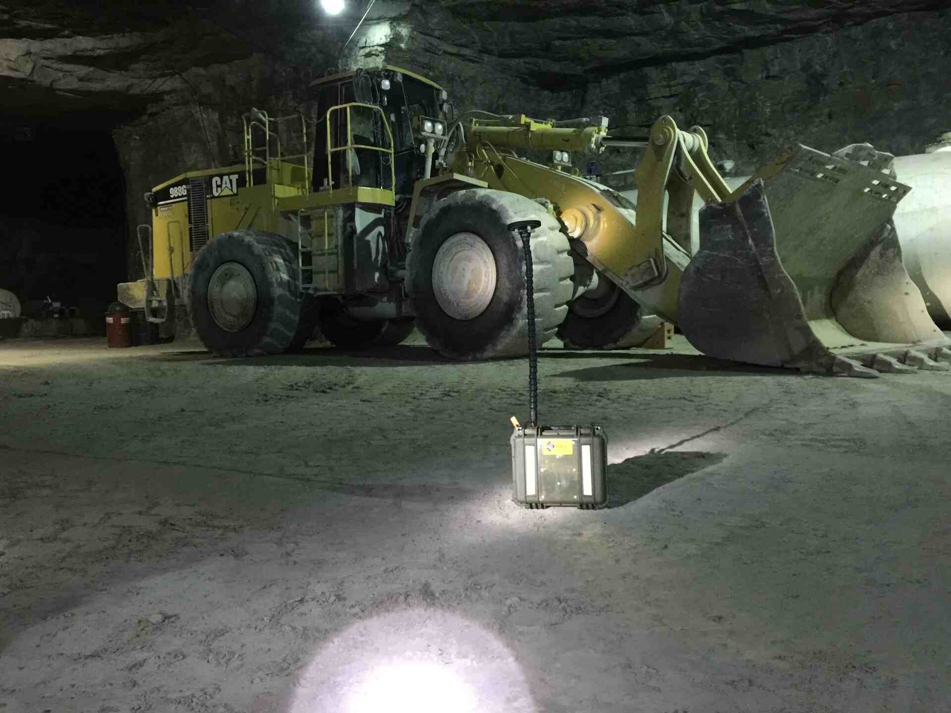 big yellow bulldozer machinery in tunnel